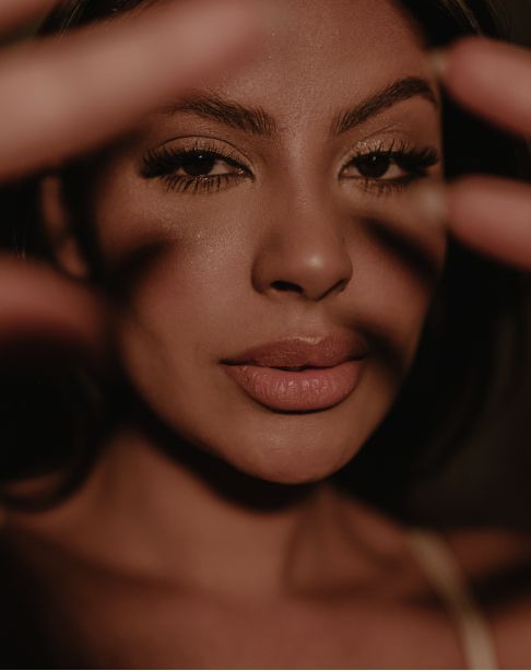 Close-up of a serene woman's face.