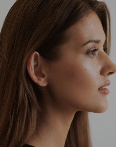 Close-up of a serene woman's face.