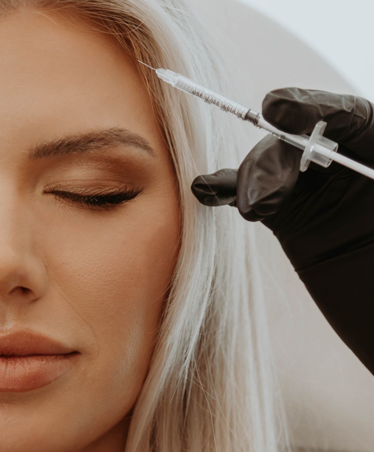 costa mesa facial balancing model patient receiving treatment