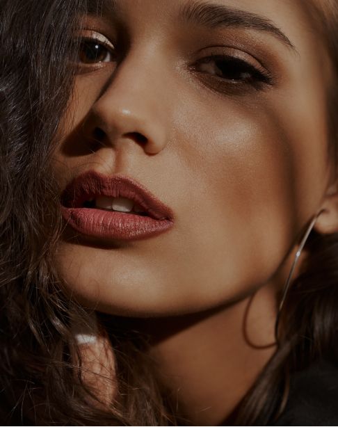 Close-up of a serene woman's face.