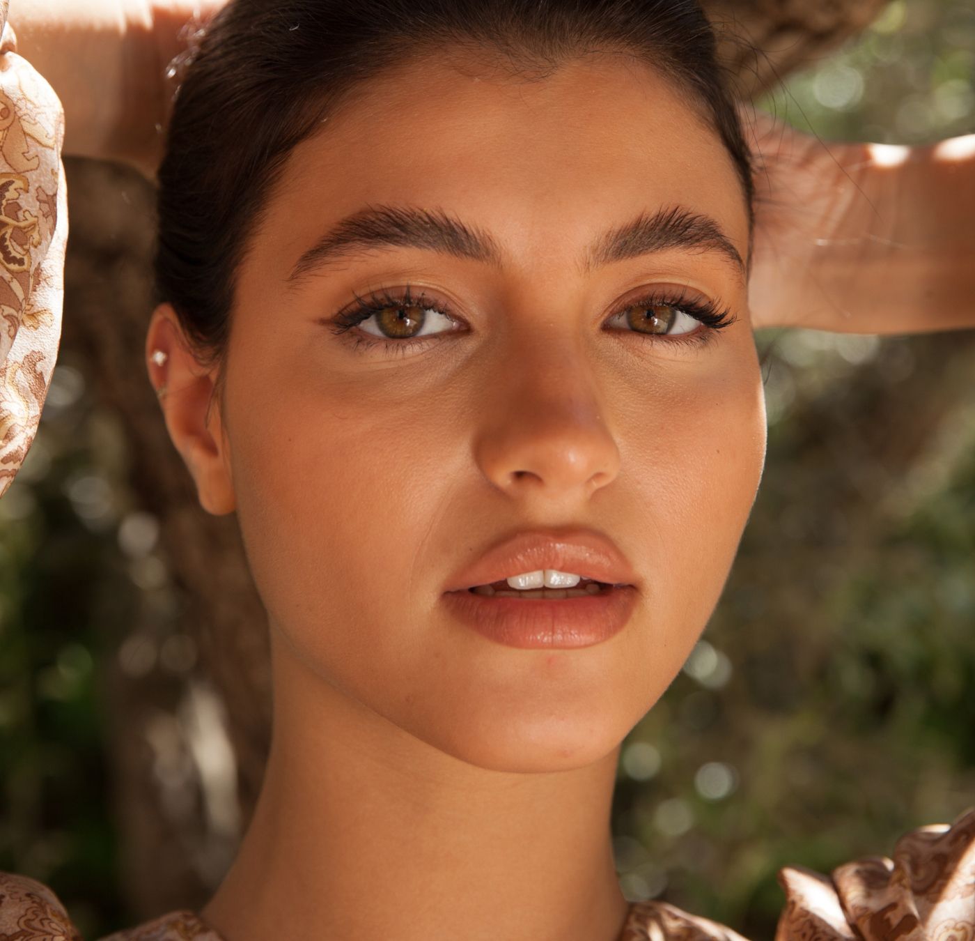 Close-up of a woman with natural makeup.